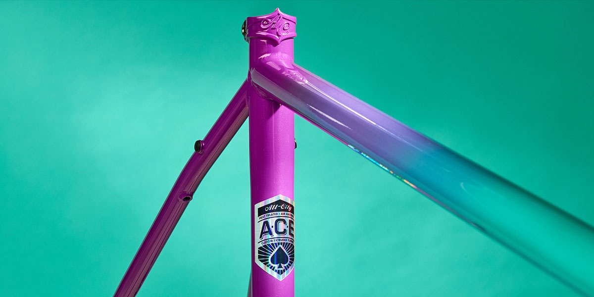 All-City Cosmic Stallion Mermaid Fade frameset side view on teal background