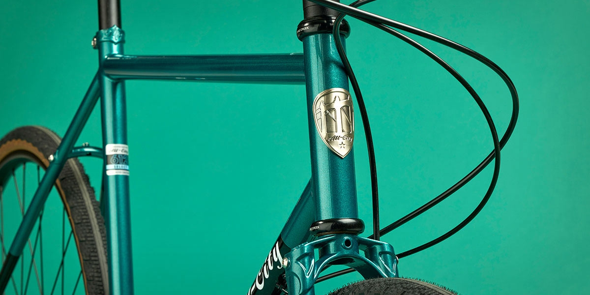 All-City Cycles Super Professional Apex 1 Night Jade bike, focus on head tube and fork crown
