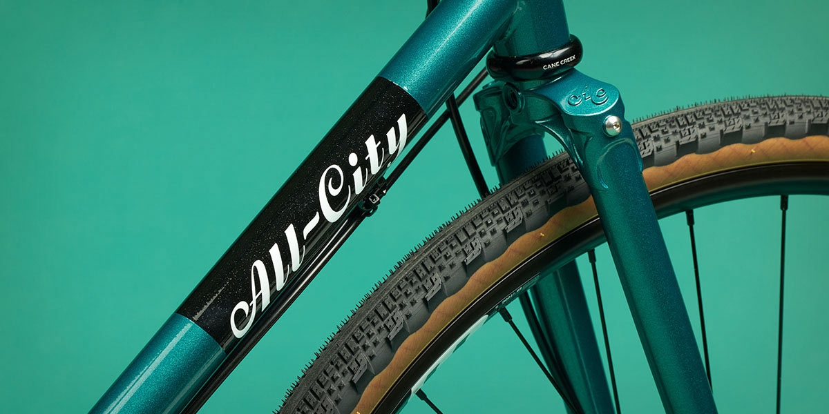 All-City Cycles Super Professional Apex 1 Night Jade bike, close-up of logo on down tube

