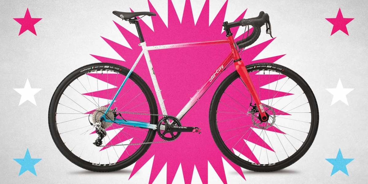 All-City Nature Cross Geared pink and white full view bike on graphic background