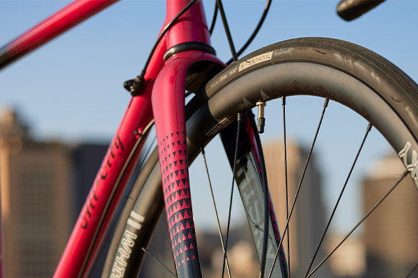 Close-up of painted to match Whisky No.9 Carbon Fork on complete Ultegra bike, Whisky logo on inside of fork leg