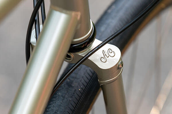 Close-up of AC logo on fork crown of Space Horse GRX bike