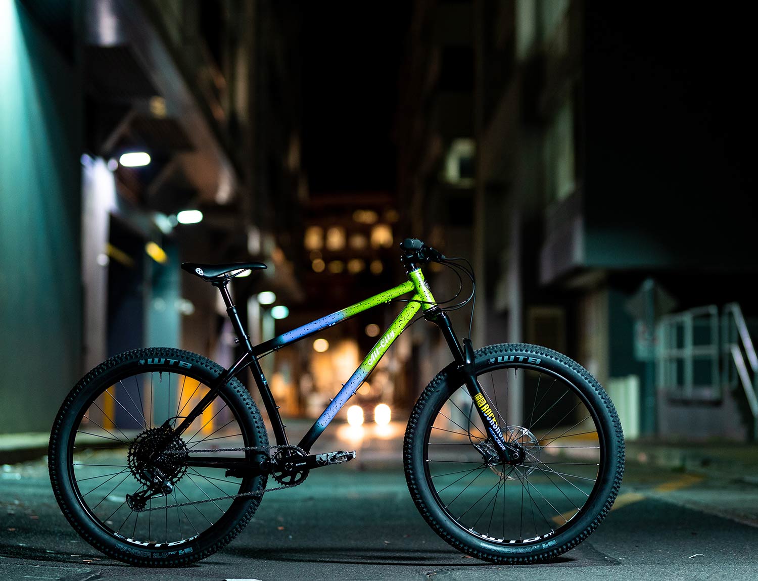 Electric queen green fade bike at night