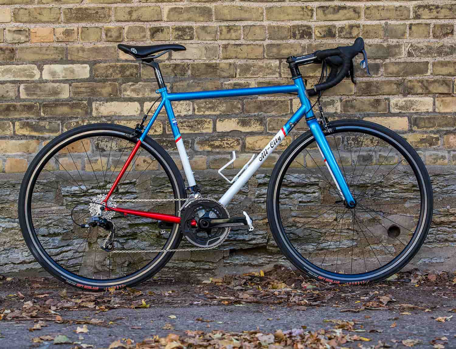 Mr Pink red, white and blue against brick wall