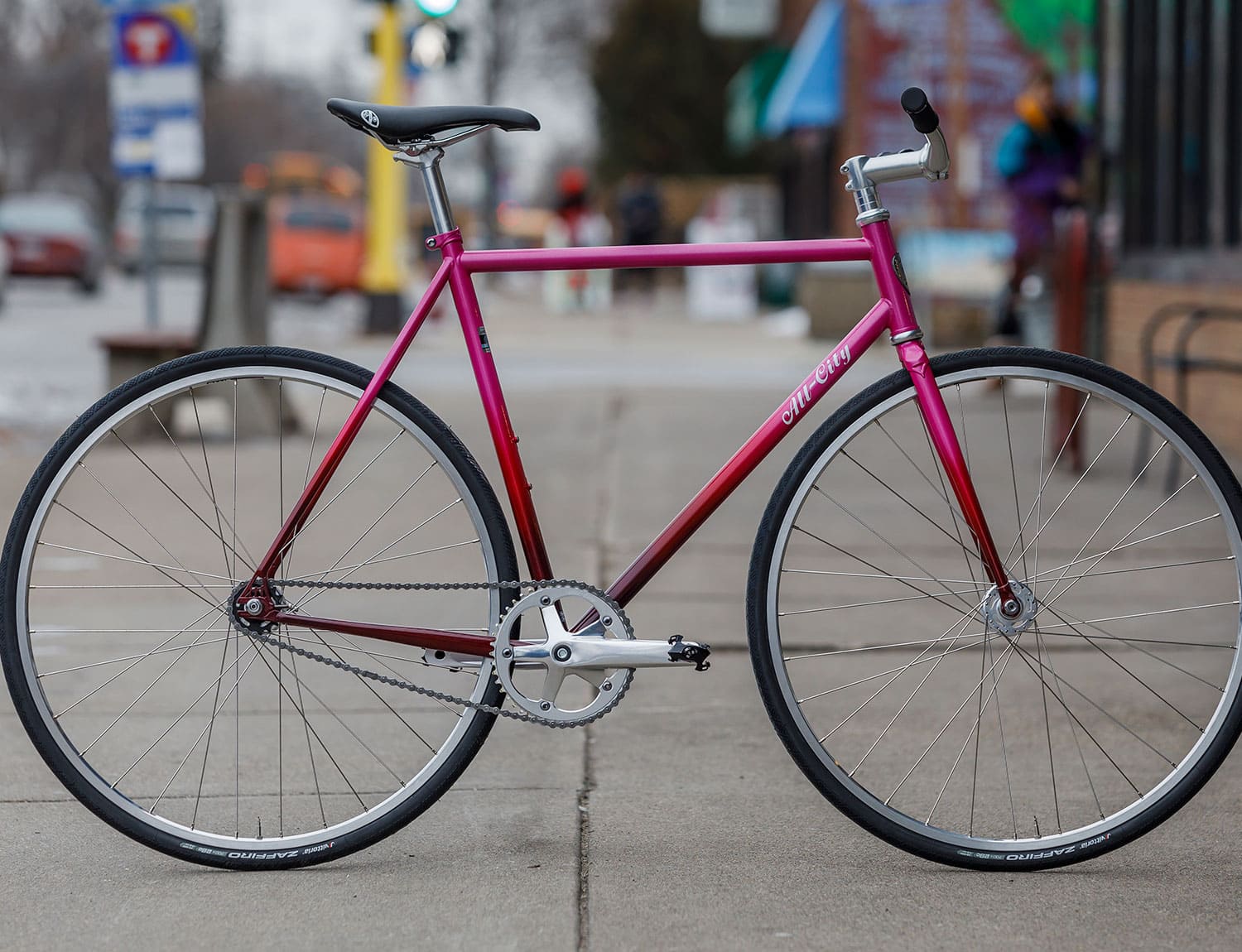 Big Block pink bike on sidewalk