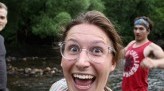 Smiling Jenny Carmichael by a lake