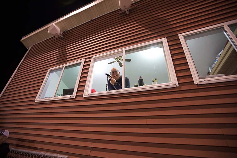 Person smiling in red house on final day of Velodrome