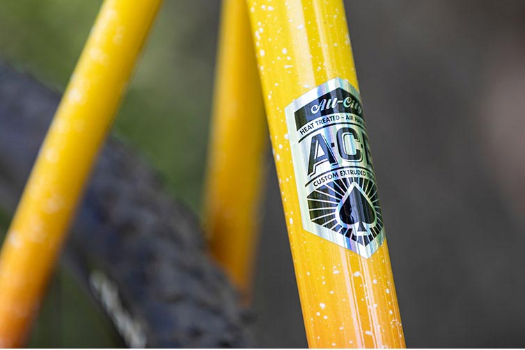 Close-up of A.C.E Tubing decal on seat tube of Nature Cross Single Speed Pink Lemonade bike