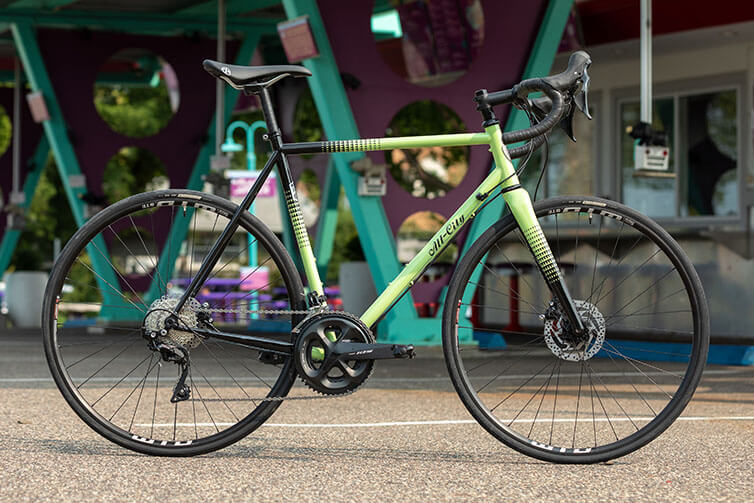 Zig Zag Ultegra in Honeydew Bling bike side view in parking lot