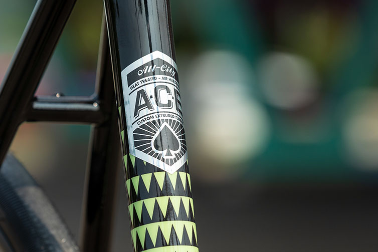 Close-up of A.C.E. frame decal on seat tube of Zig Zag Ultegra Honeydew Bling green color
