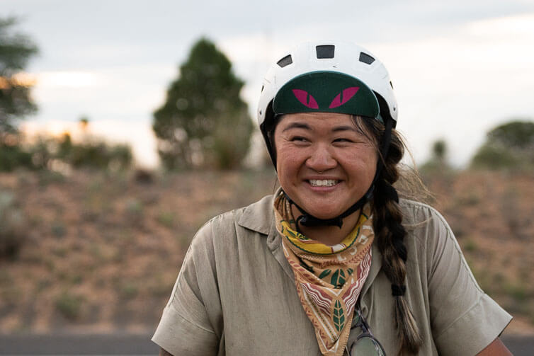 Kae-Lin Wang smiling, taking a break from riding