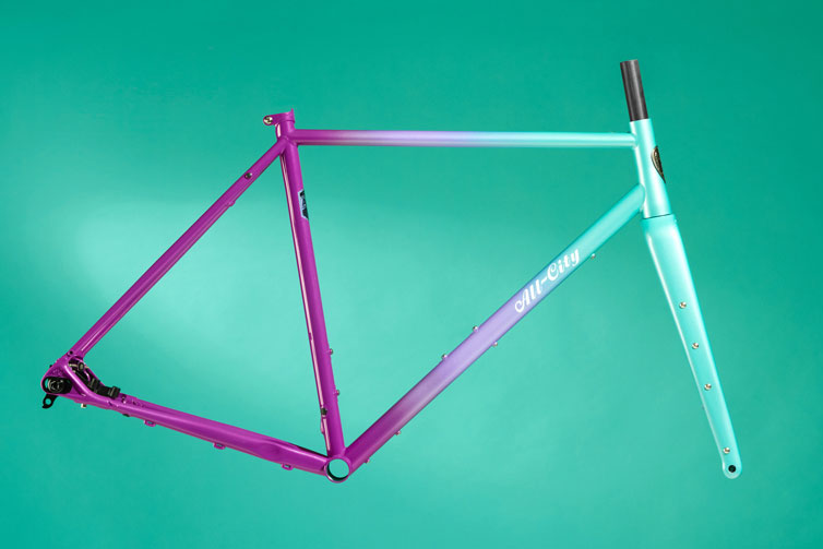 All-City Cosmic Stallion frameset in Mermaid Fade color side view on teal background