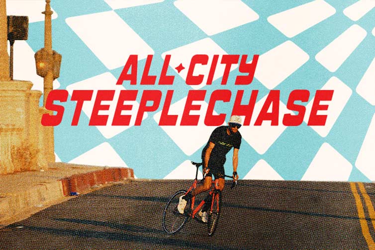 All-City Steeplechase - cyclist on empty city street doing skid on fixed gear track bike with blue and white checked background