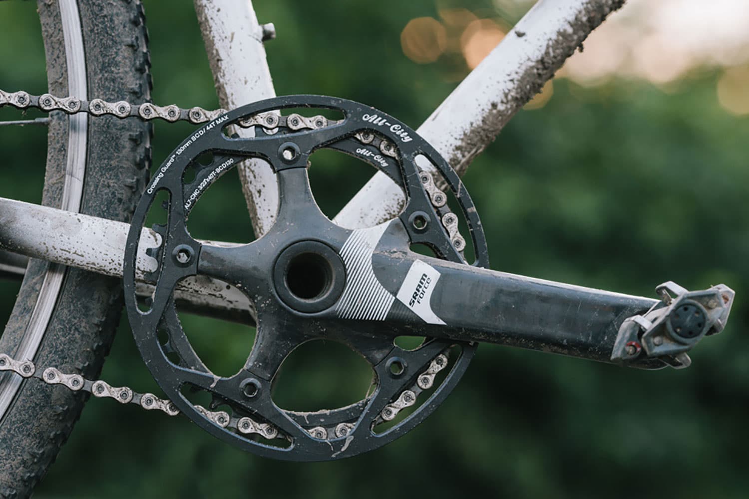 Black All-City cycles Cross Chainring on silver bike with outdoor background
