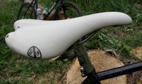 White All-City Gonzo seat on black frame with outdoor background