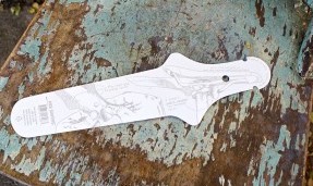 White foldable Wangaaa! fender on wood background