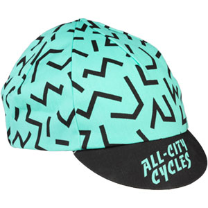 All-City Cycles teal and black Max Cycling Cap on a white background