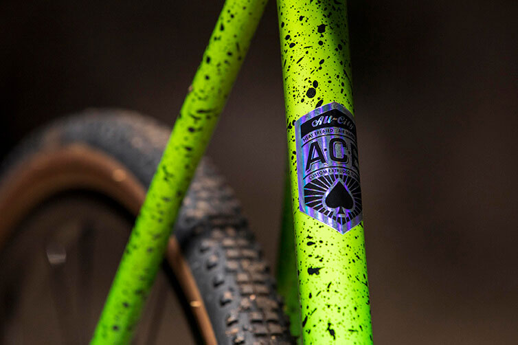 All-City A.C.E. Tubing decal on splatter painted cyclocross bike